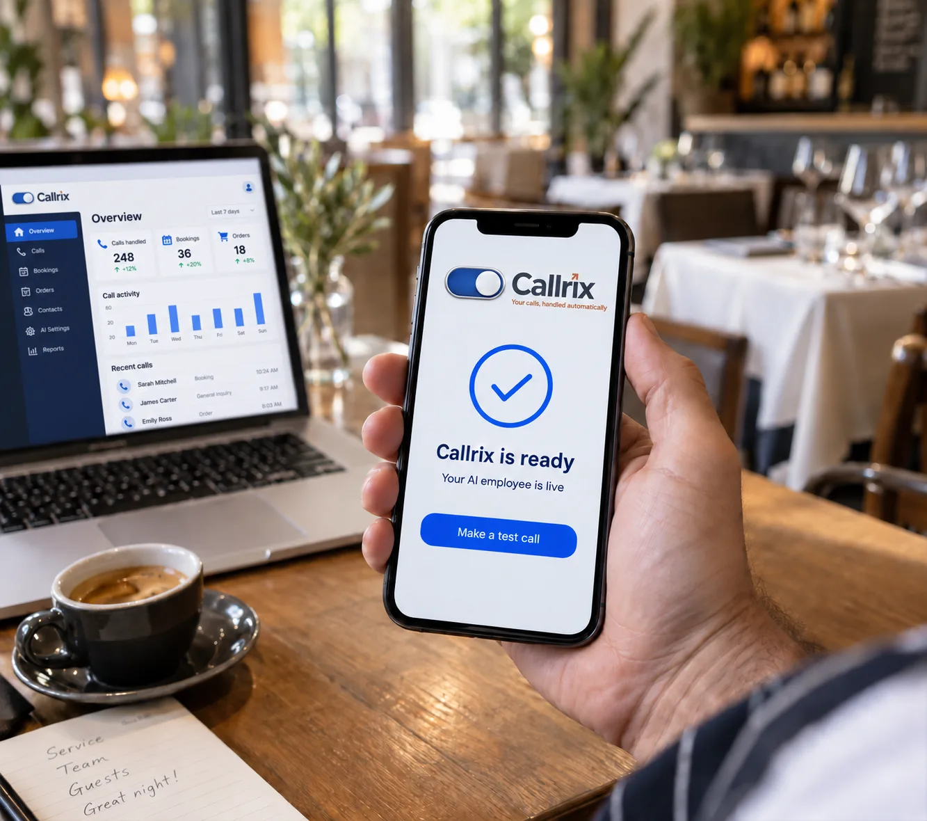 A phone showing Callrix is ready beside a laptop displaying the Callrix dashboard in a restaurant
